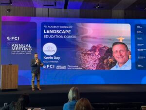 A Lendscape representative presenting on stage during a session at the FCI Annual Meeting, highlighting platform capabilities.